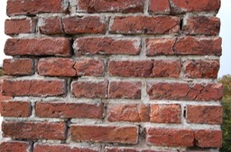 Badly damaged original brick