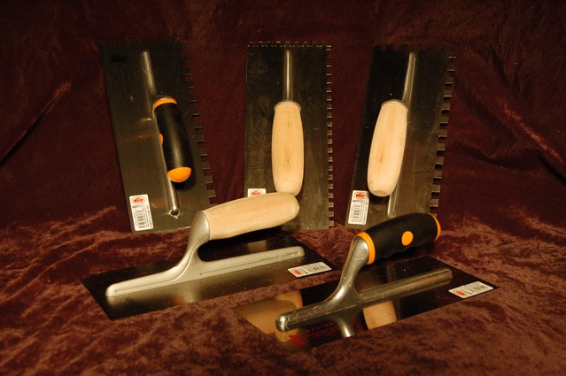 Stucco, plaster and notched trowels